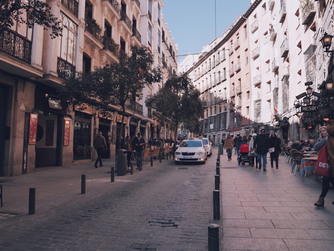 taxi on the city streets, european architecture